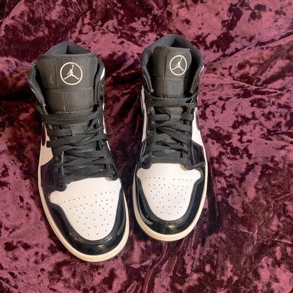 black and white Jordan 1s
